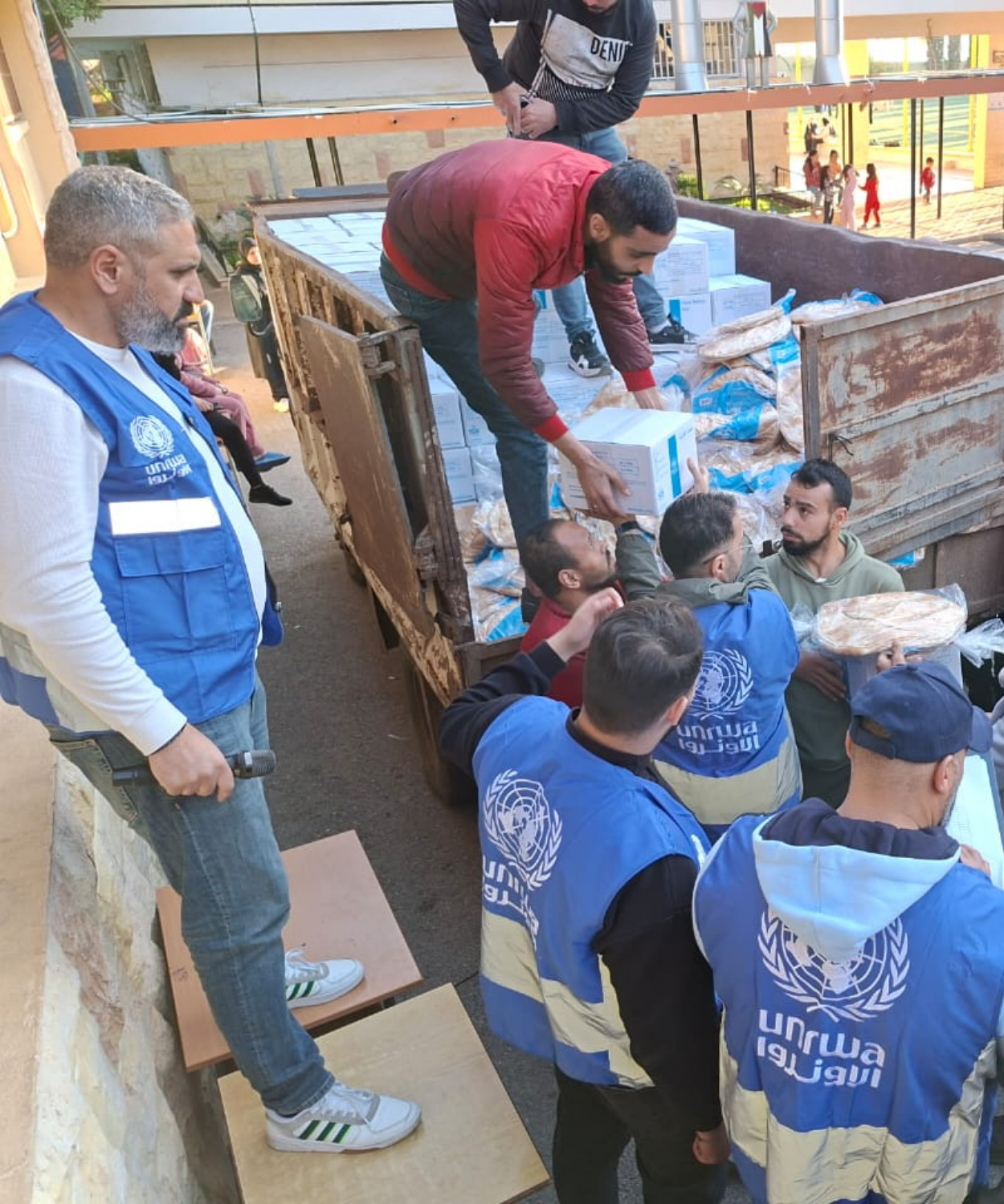 Today, @UNRWA teams distributed food to displaced families in our emergency shelters while also creating job opportunities for #PalestineRefugee youth, who are supporting the response and helping deliver assistance to those in need.