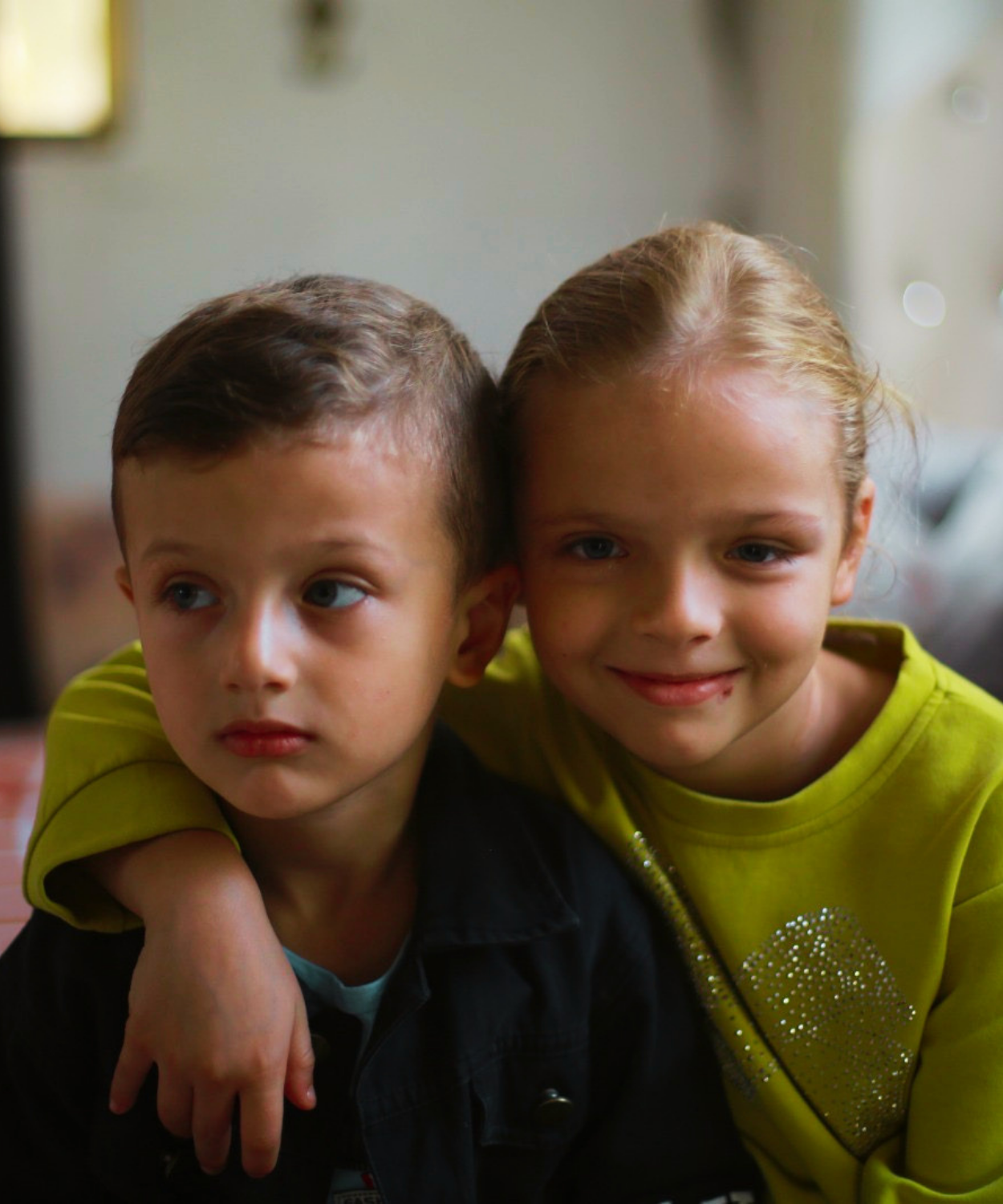 Two children together in Gaza, highlighting support for separated and orphaned Palestine Refugee children